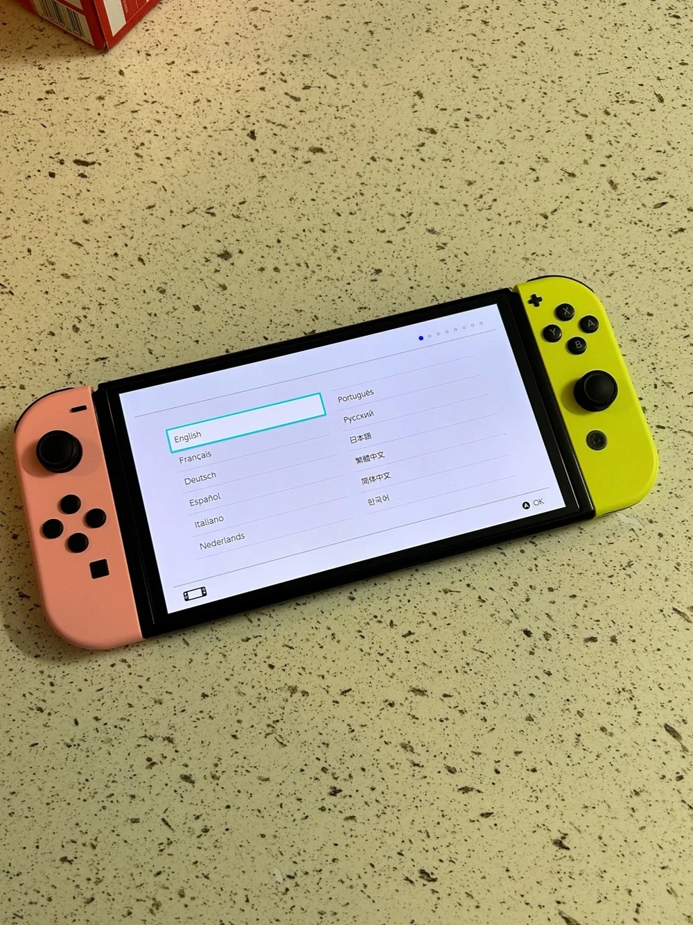 Nintendo Switch with Pastel Pink and Yellow Joycons + Accessories (Preowned)